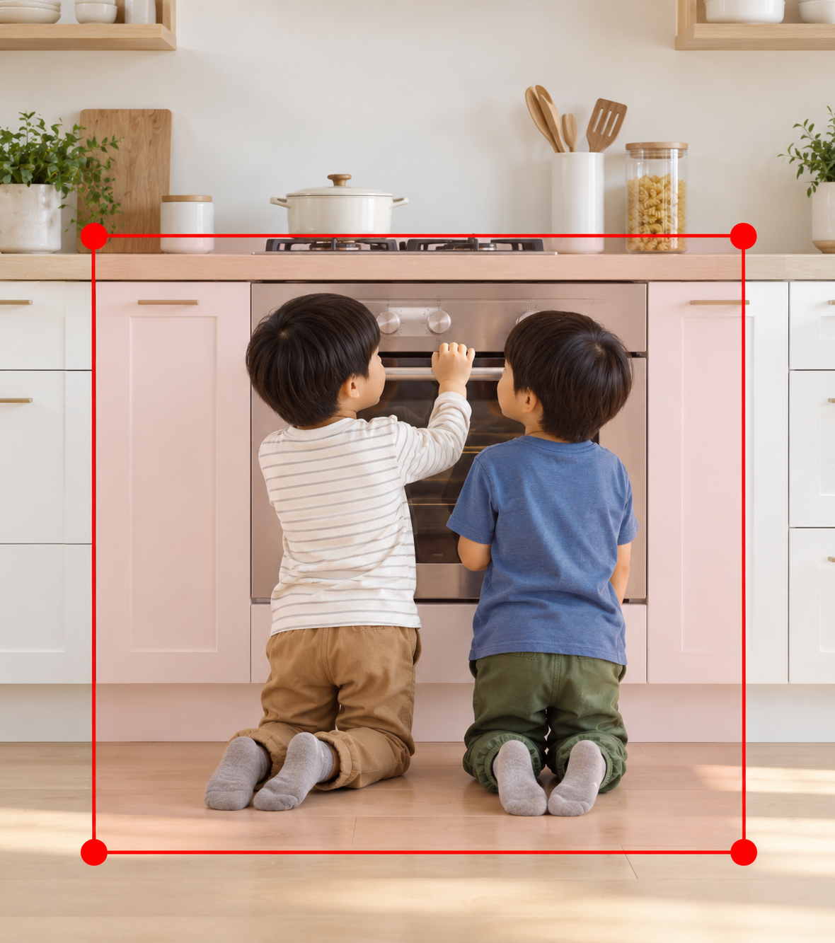 Children in a kitchen with a red monitoring area shown