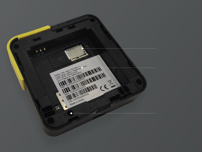 Back cover removed showing the SIM card slot, Wi-Fi name and password label, and reset button