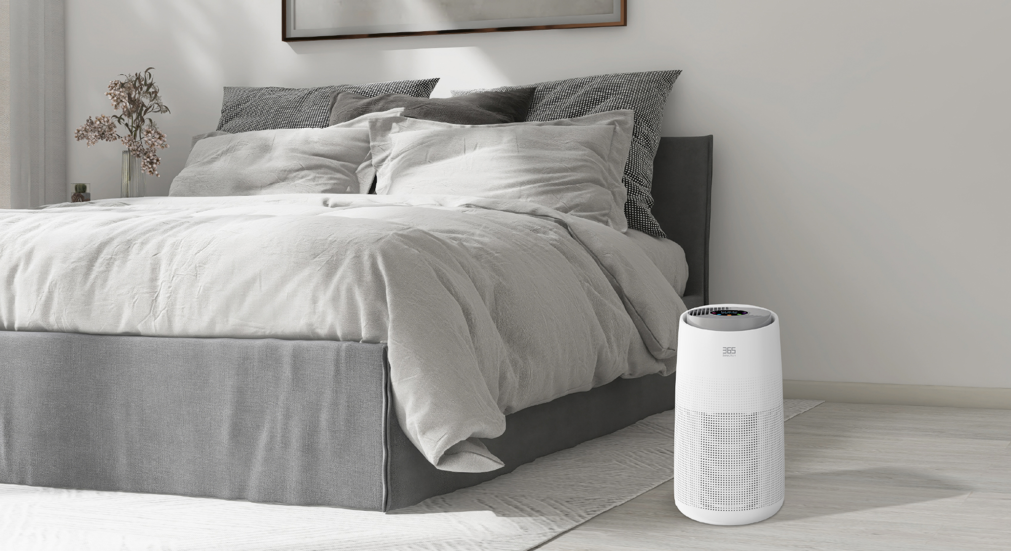 Air purifier beside a bed