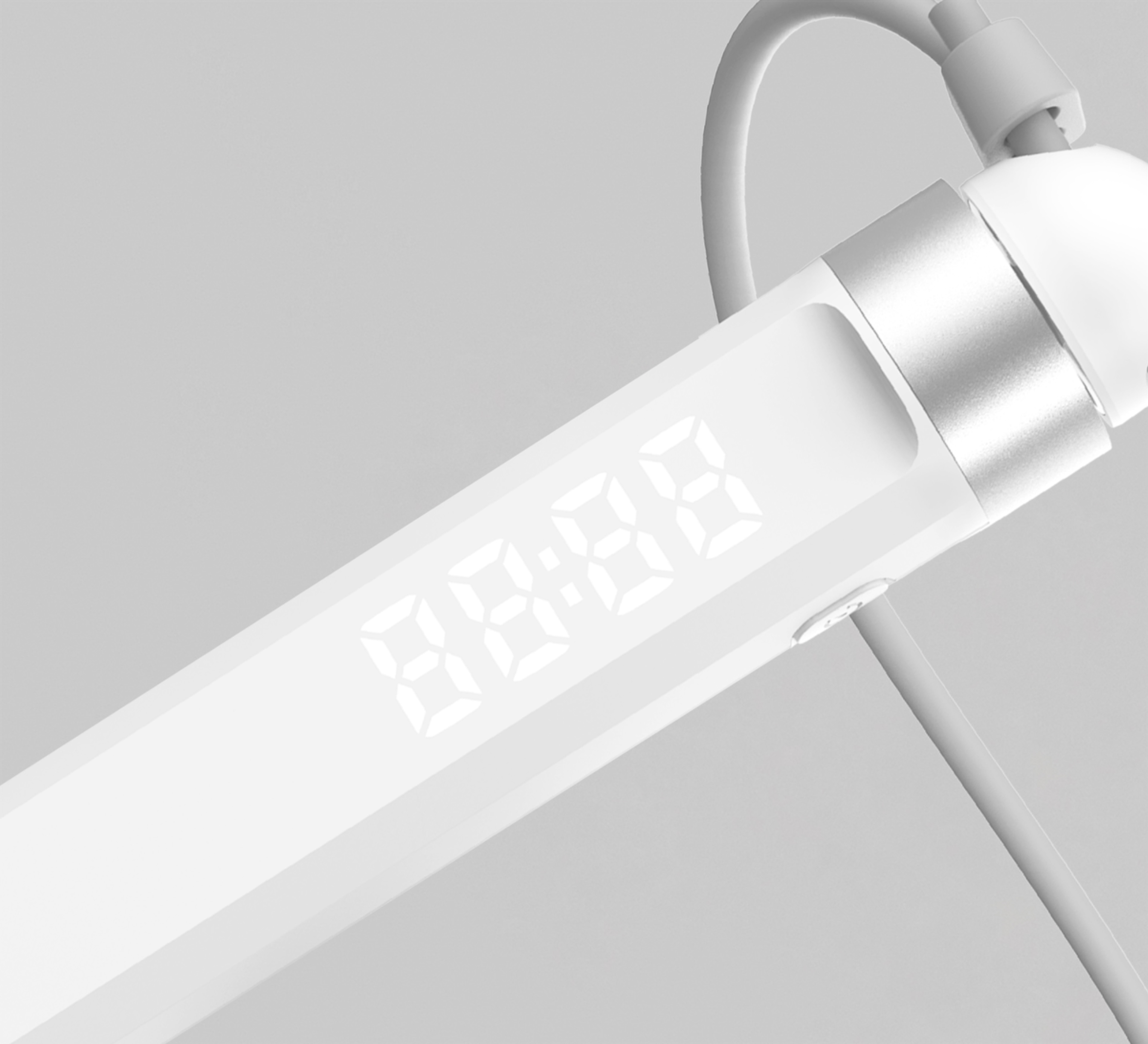 Close-up of the illuminated LED display on the handle