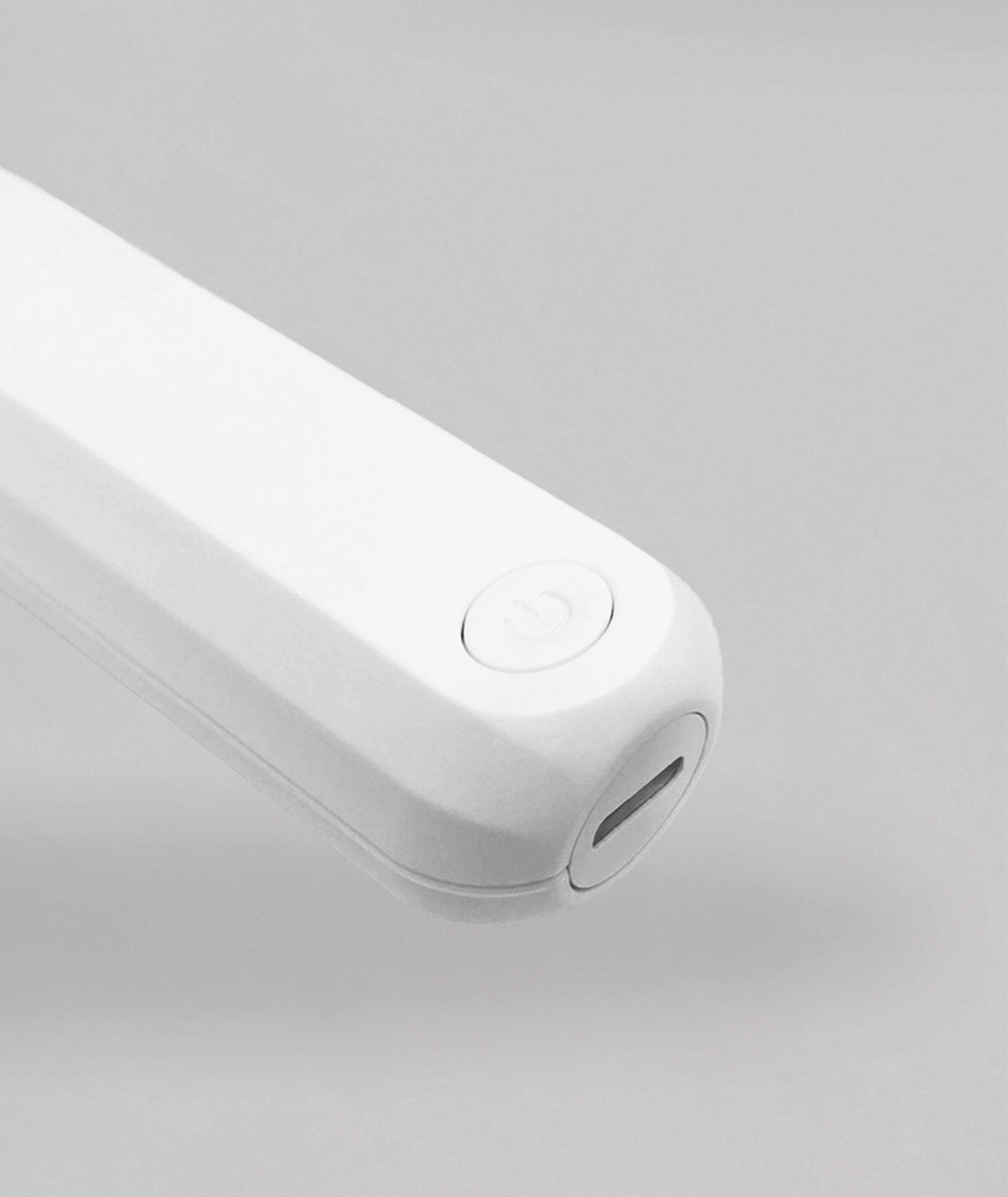 Close-up of the JR2 handle with its power button and USB Type-C port