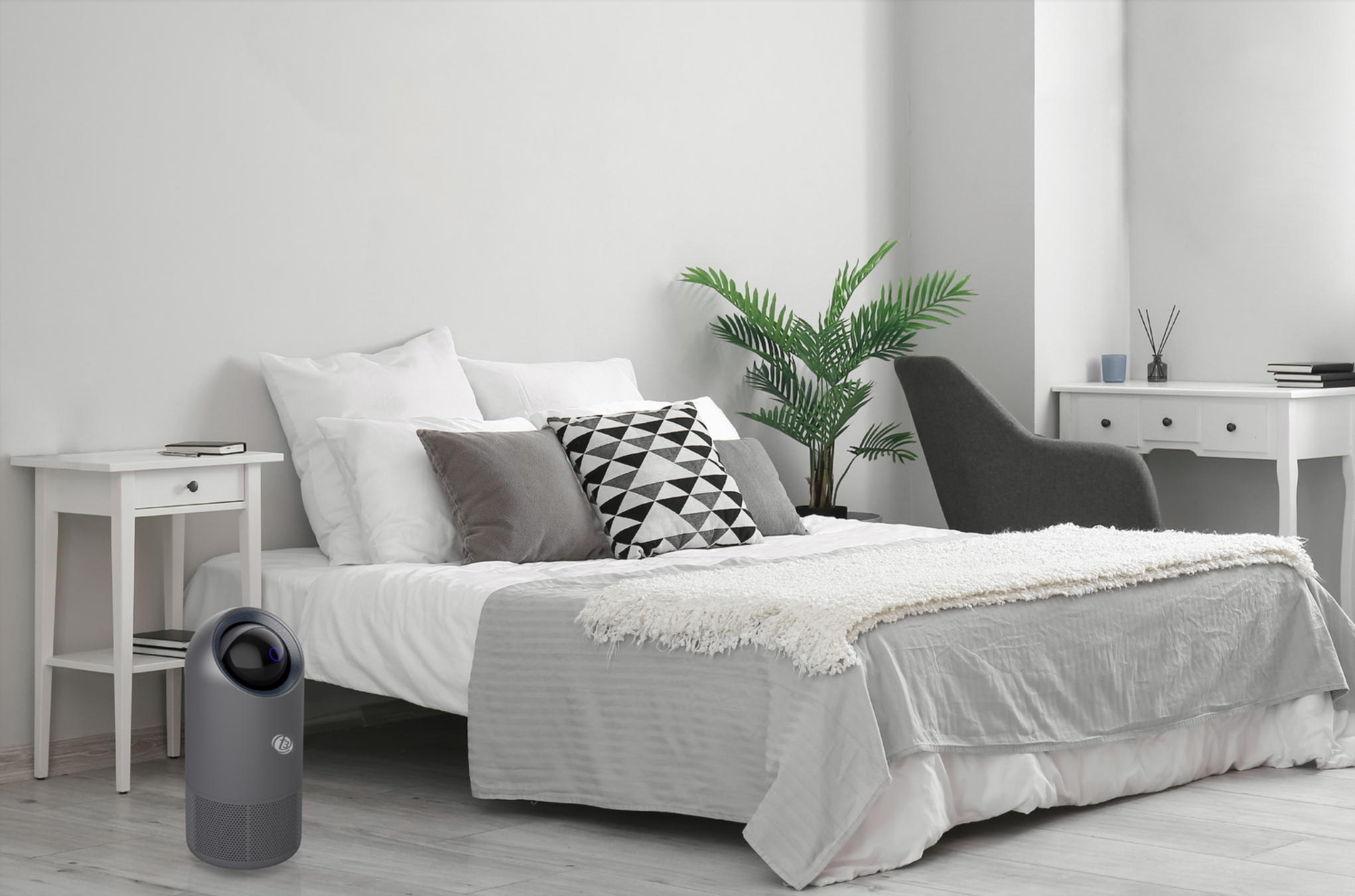 Air Purifier A2 位于明亮卧室的床边
