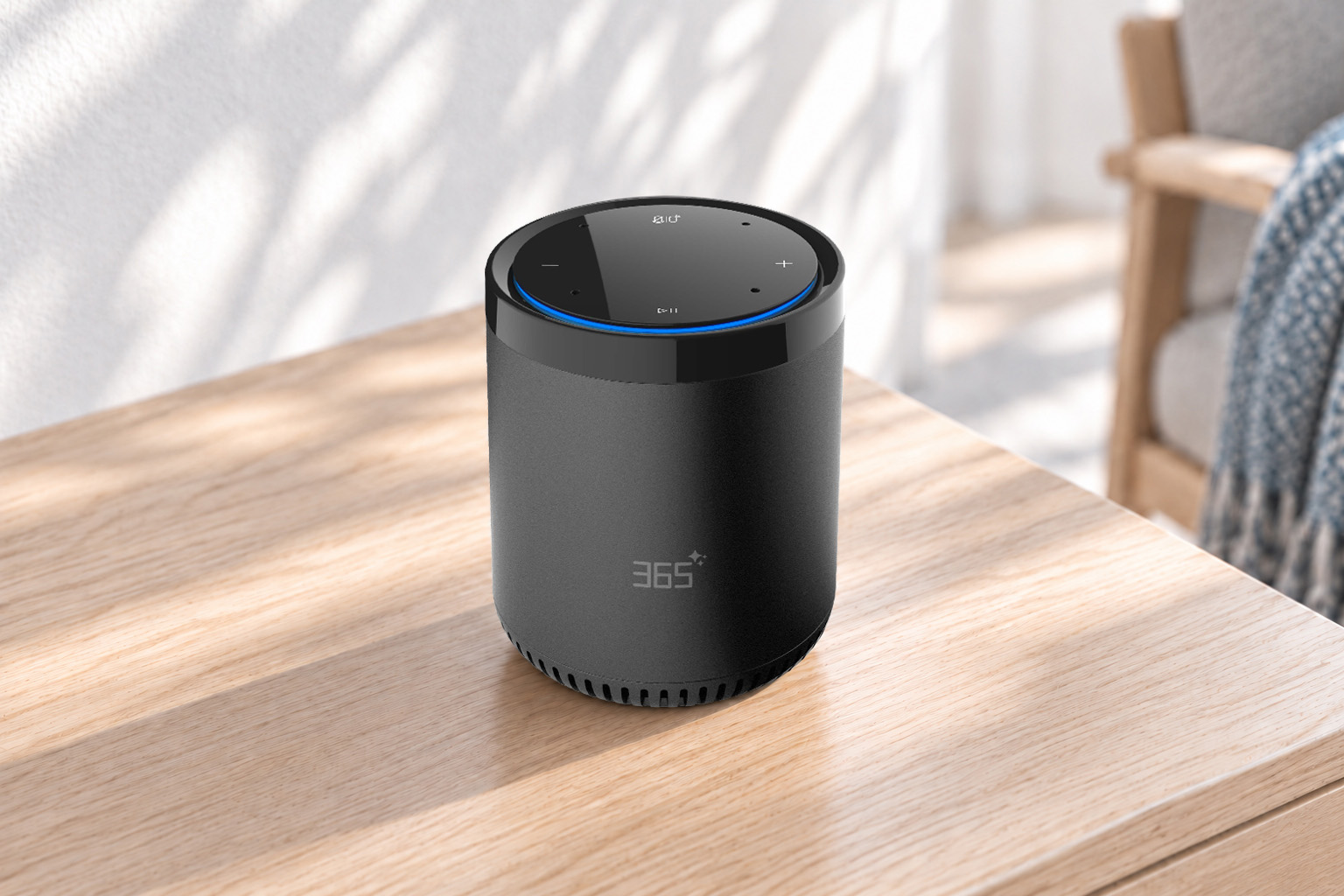 Matte charcoal AI speaker with blue LED ring on a wooden table in daylight